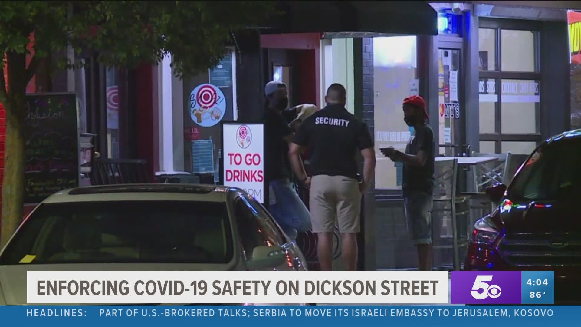 Enforcing COVID-19 safety on Dickson St.
