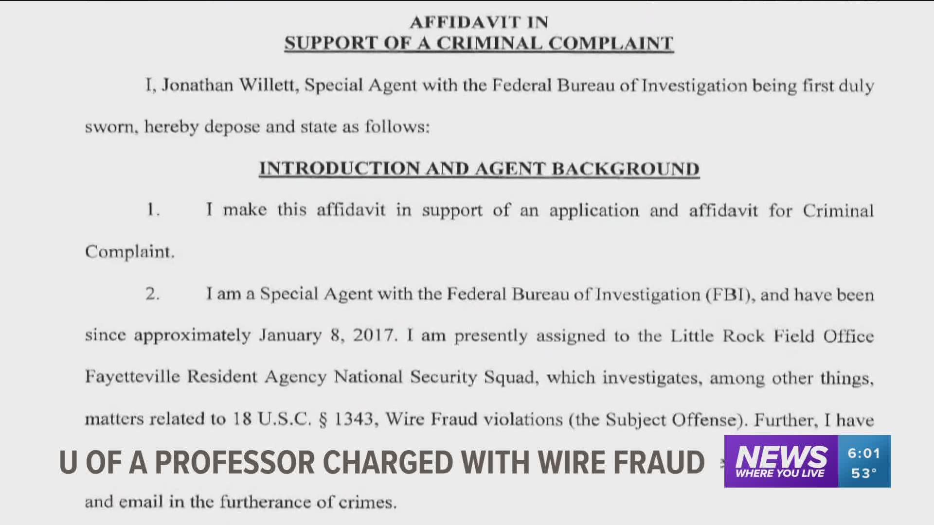 UA professor charged with wire fraud