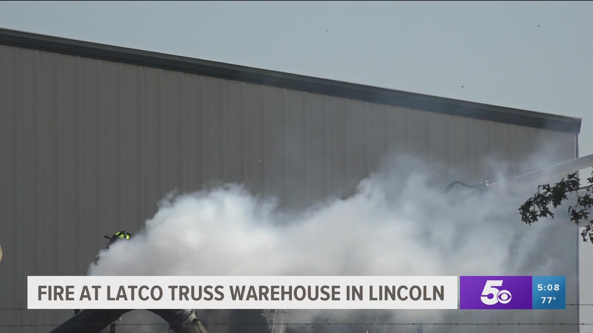 Officials say one person was checked for injuries but was not taken to the hospital after a fire at the Latco Truss warehouse in Lincoln.