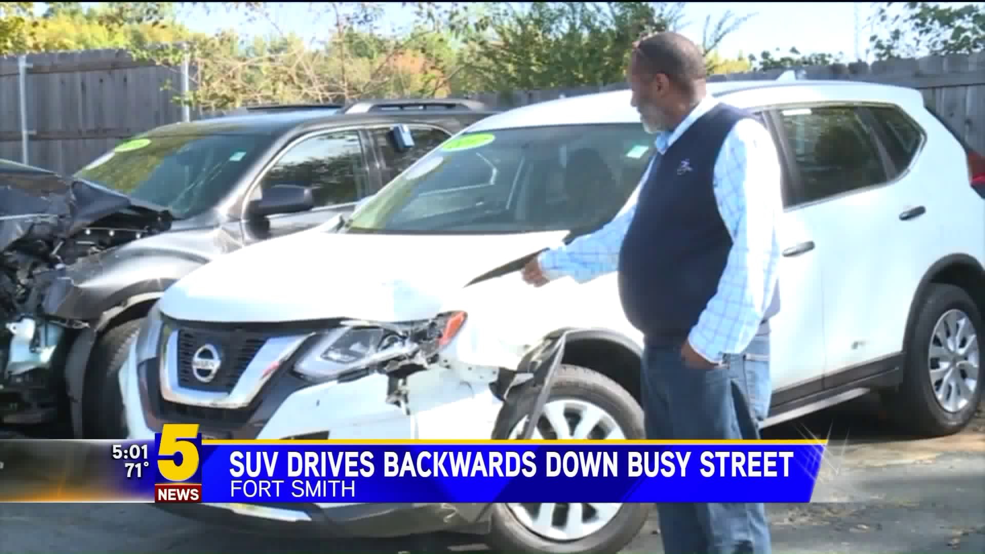 SUV Drives Backward On Busy Fort Smith Street Crashing Into Car Dealership