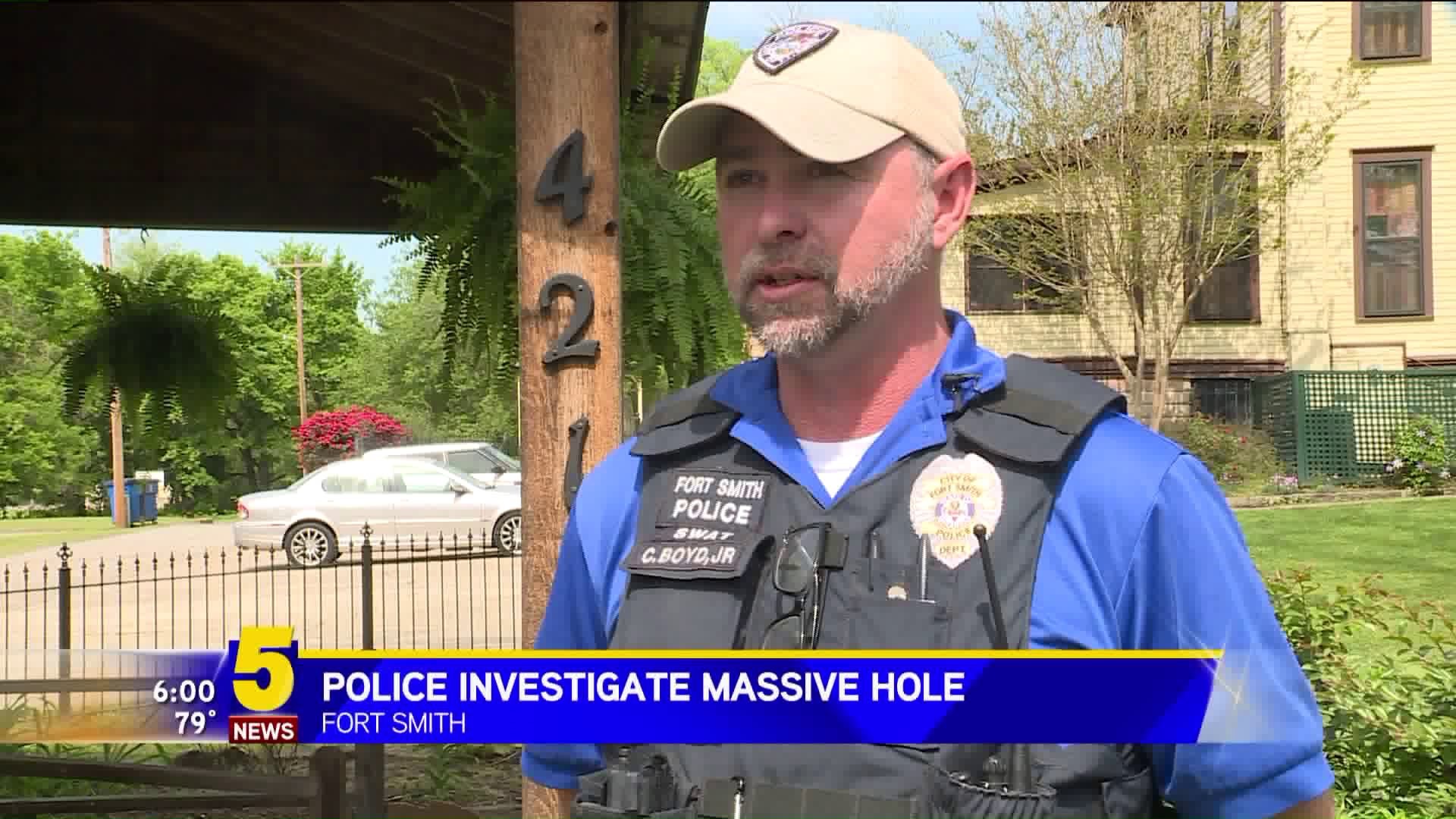 Police Investigate Massive Hole