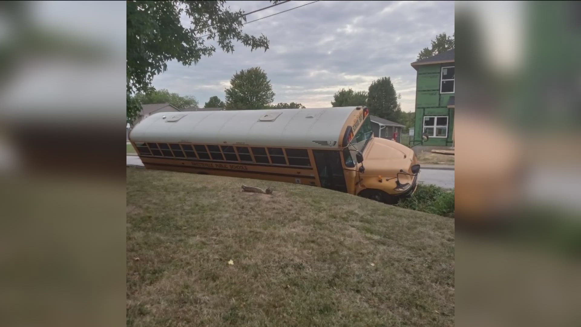 Fayetteville Public Schools said the driver was trying to allow another car to pass on the side, but the bus was on the very edge of the street.