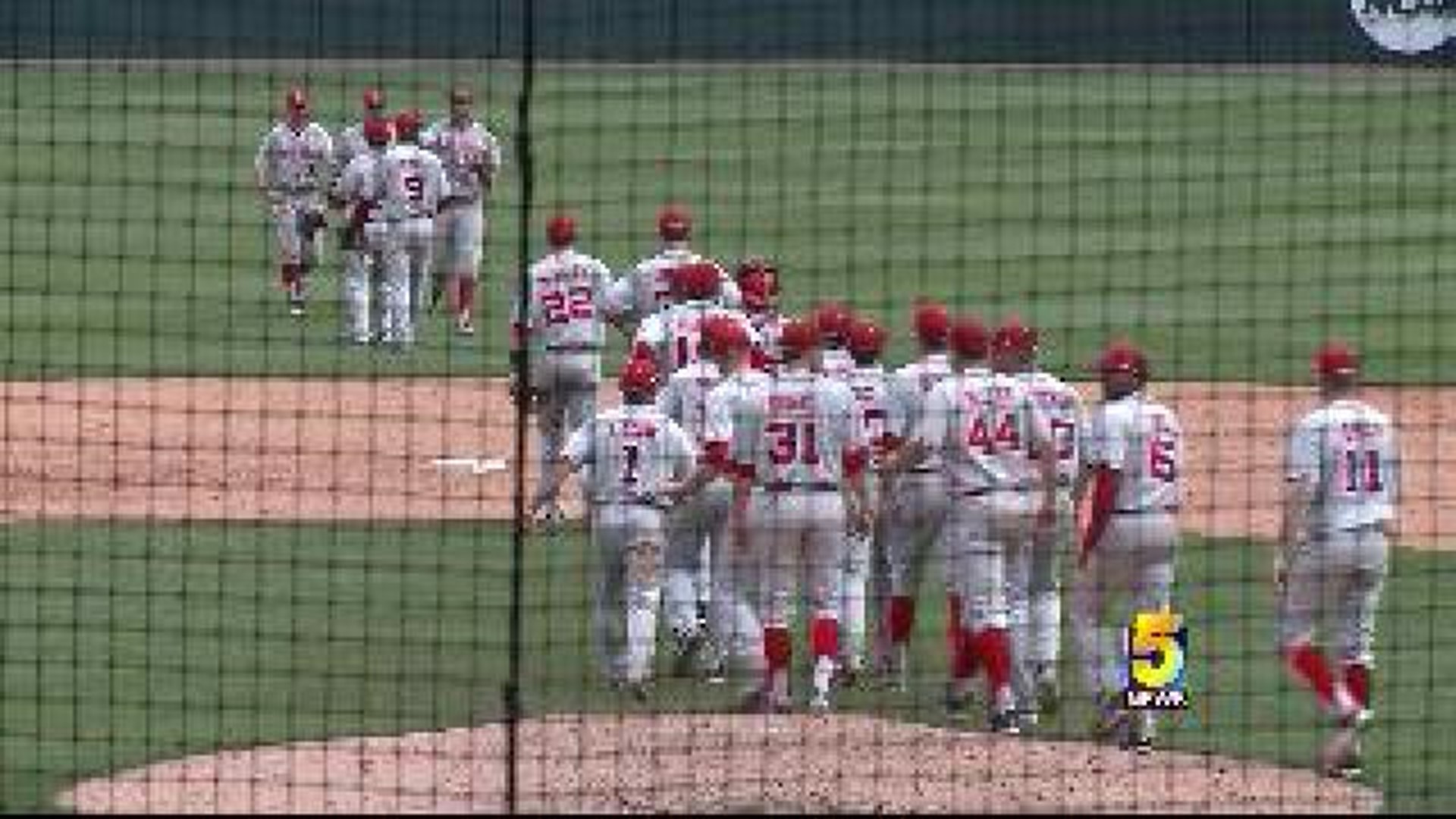 Hogs Split With Huskers