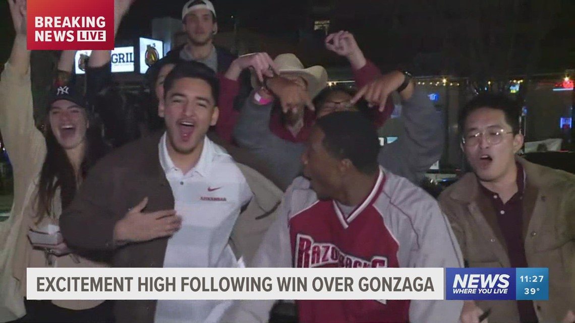 Hog fans celebrate after win over Gonzaga during Sweet 16 game