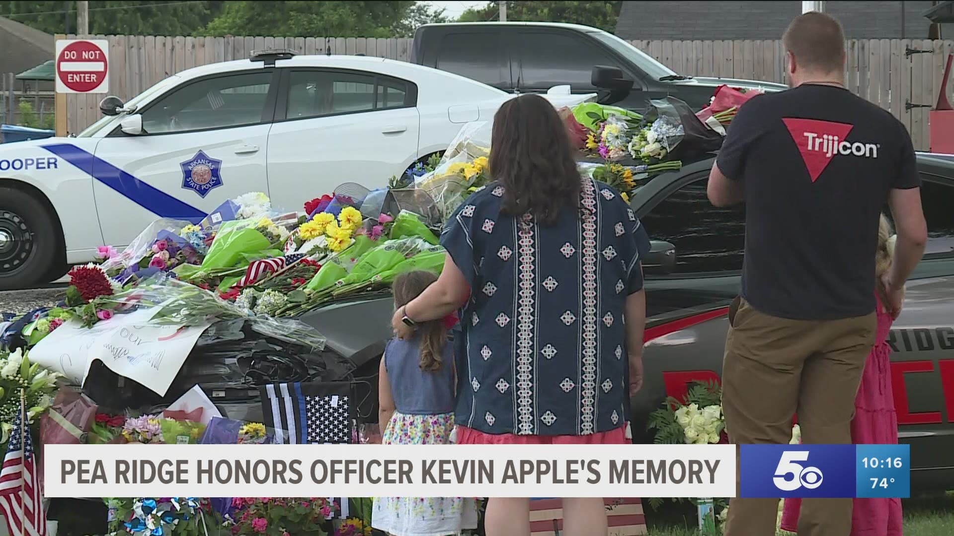 The small community of Pea Ridge continues to mourn the death of an officer killed while on duty.