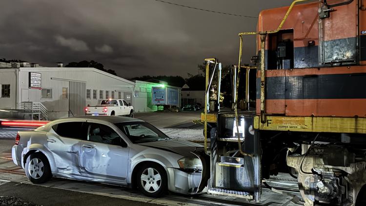 Train crashes into car stuck on tracks in Salem