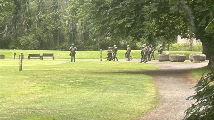 Tactical teams near Eastmoreland Golf Course search for suspect accused of firing at Milwaukie police