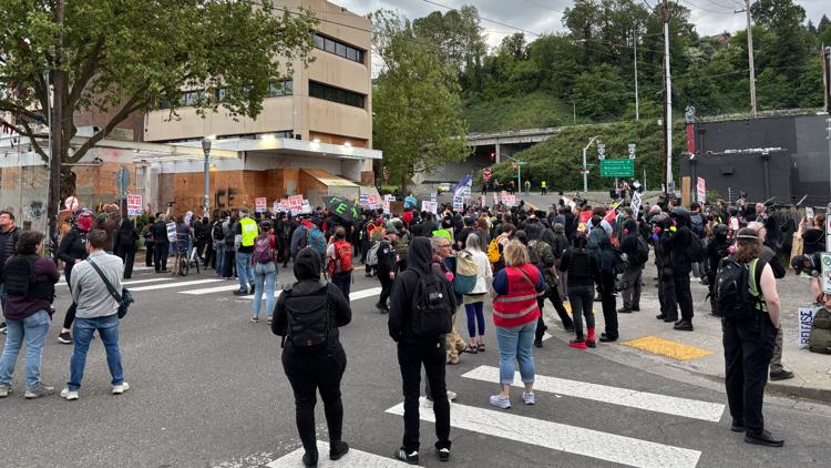 May Day demonstrators march on ICE facility in South Portland