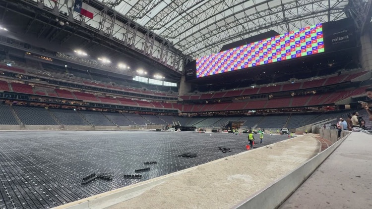 ‘This is the fun part’ | An up-close look at crews installing the soccer pitch inside Houston Stadium for World Cup matches