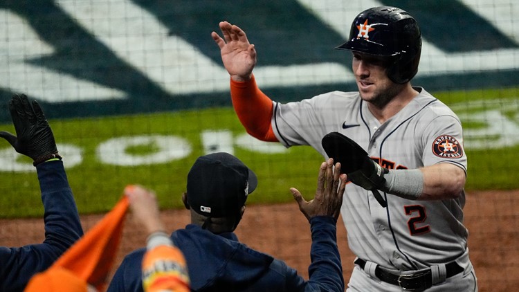 Astros stay alive with 9-5 win over Braves in Game 5 of World Series