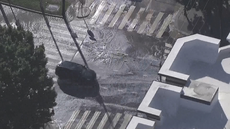Water main break floods intersection near Daikin Park