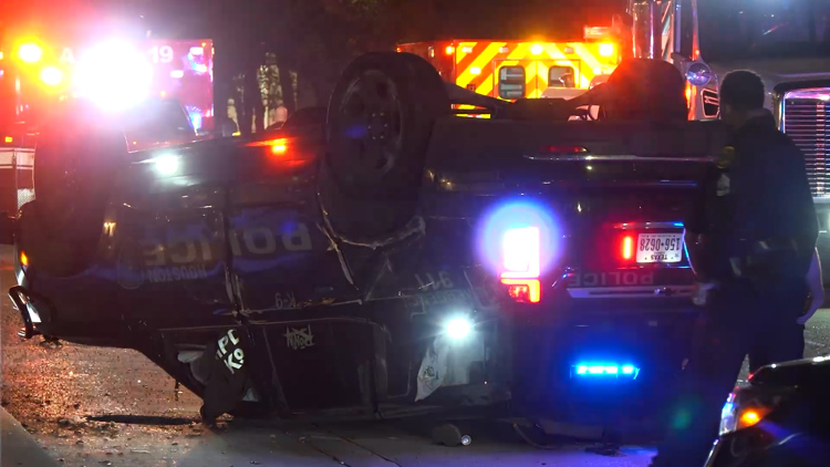 Officer, K-9 recovering after rollover crash while responding to call in downtown Houston, police say