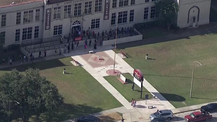 Hazmat crews responding to Baytown Lee High School; one staff member suffered minor injuries