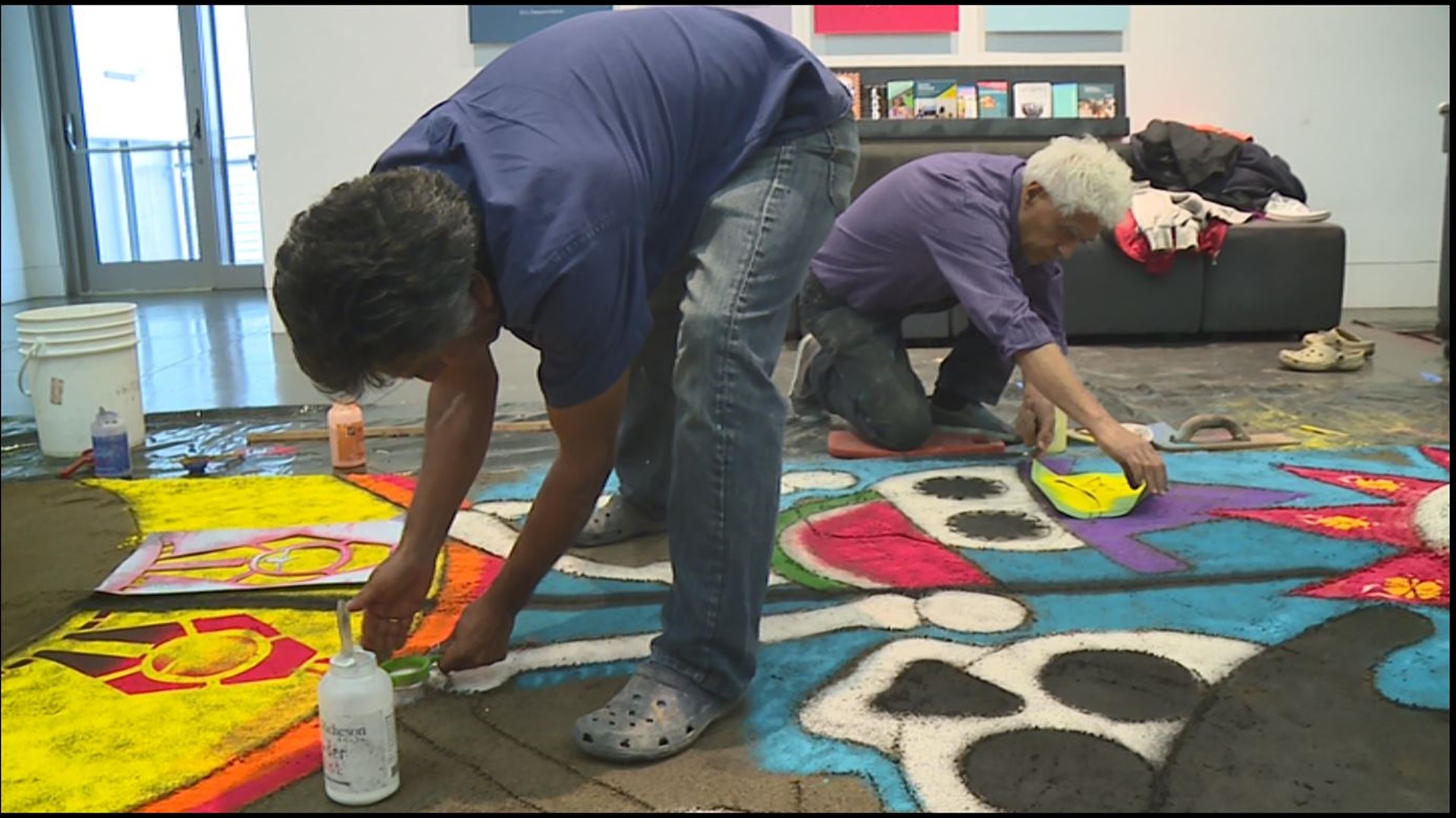 A Seattle sand painter makes a colorful statement about what's happening on the U.S./Mexico border.