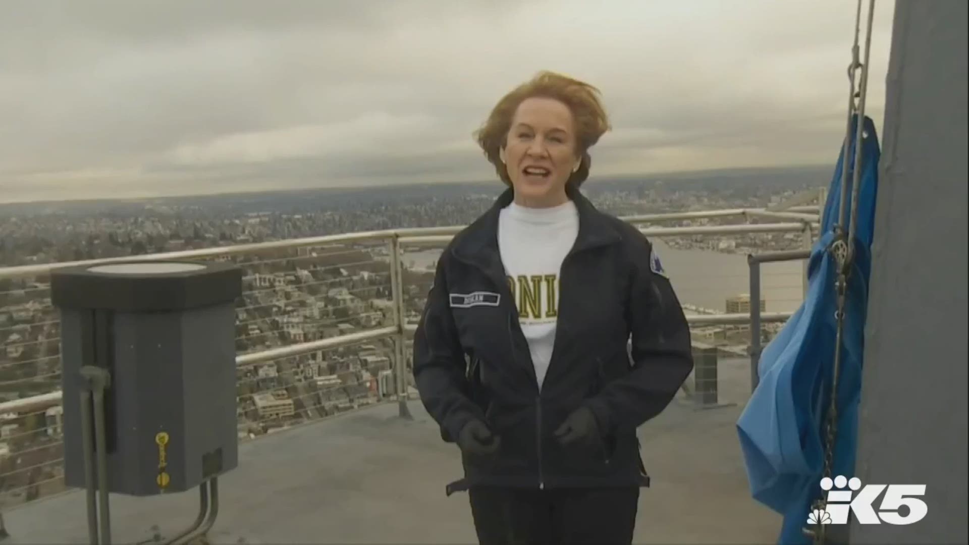Mayor Jenny Durkan raised a flag that says "We got this Seattle" atop the Space Needle Thursday.