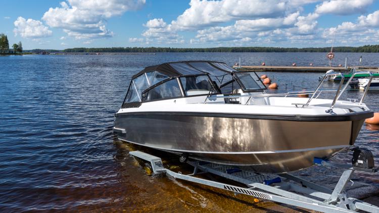 Truck, boat trailer roll into Lake Sawyer