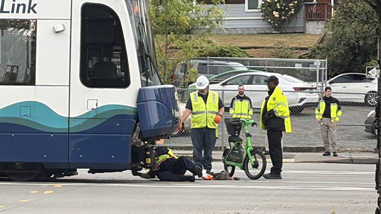 Lime glider trapped under light rail after collision between rider and train