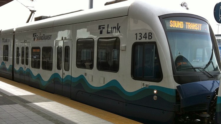 Woman dies after being struck, trapped by light rail in Seattle ...