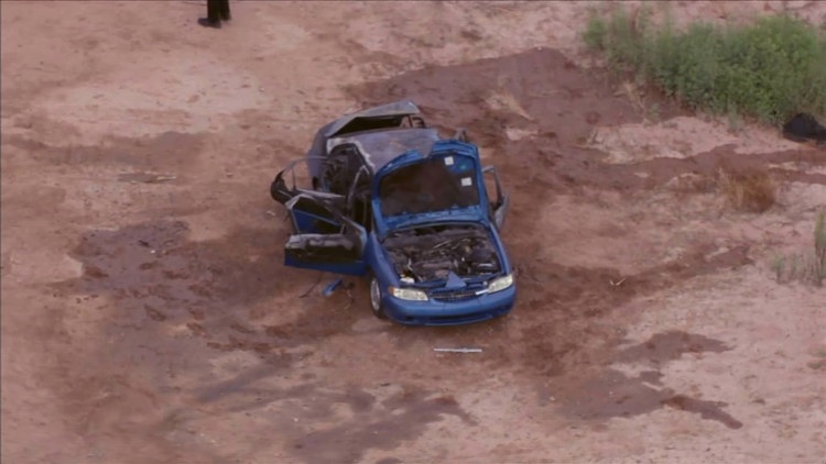 Police investigate after body found in burnt car in Gilbert