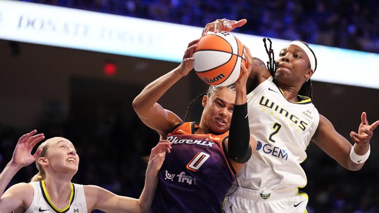 James scores 28, Bueckers 23 as the Wings start 4 rookies in a 98-89 win over the Mercury