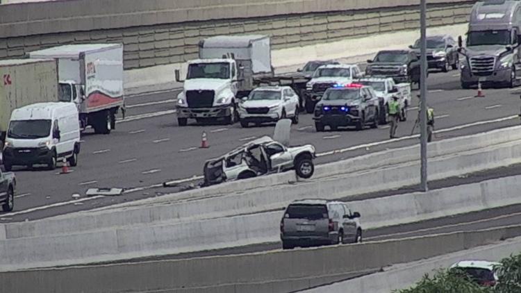 1 person critically injured after car rolls and hits concrete median on Interstate 10