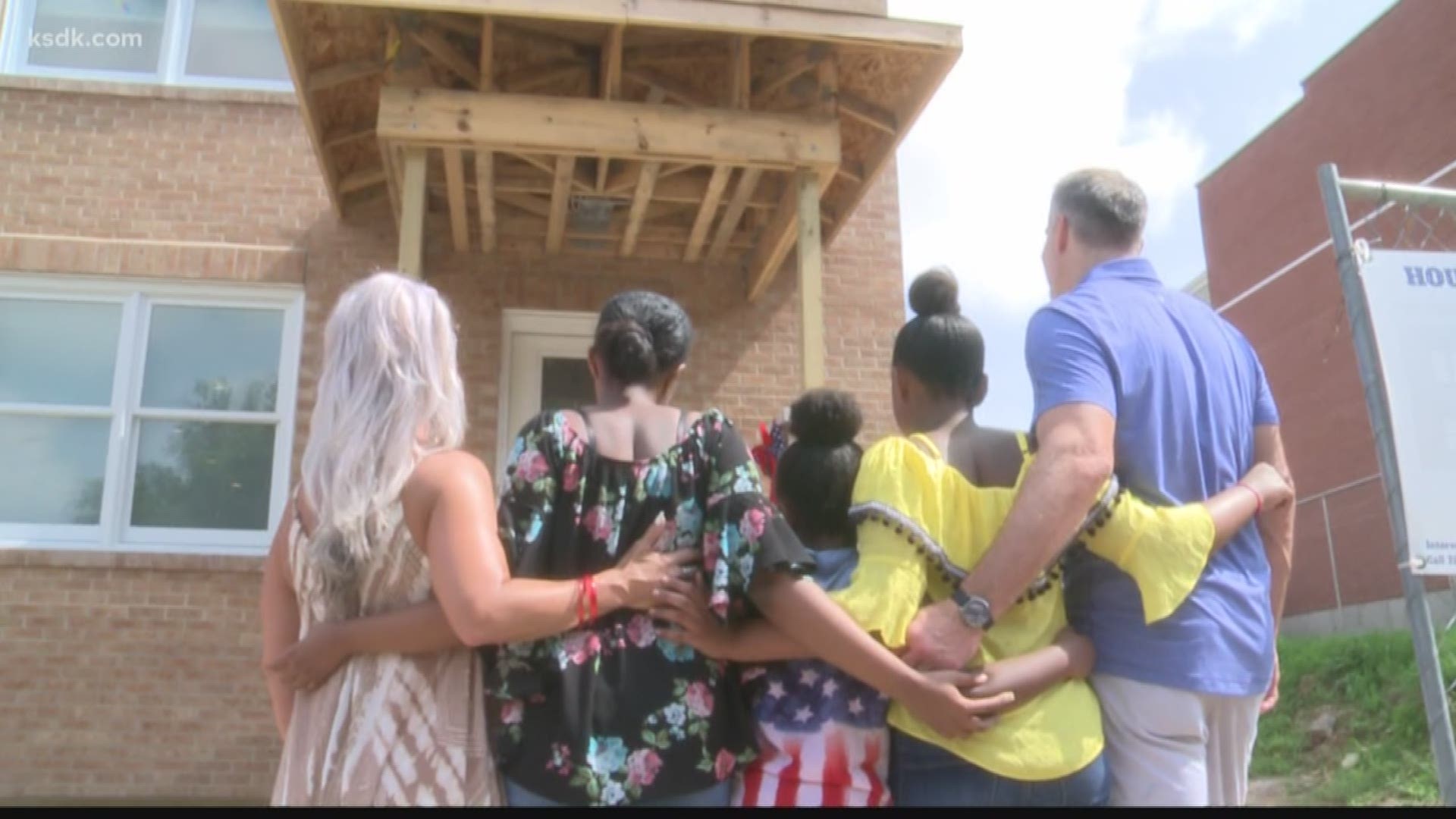 Former Rams quarterback Kurt Warner was on hand Saturday as Habitat for Humanity gave a home to a single mother and her four daughters.