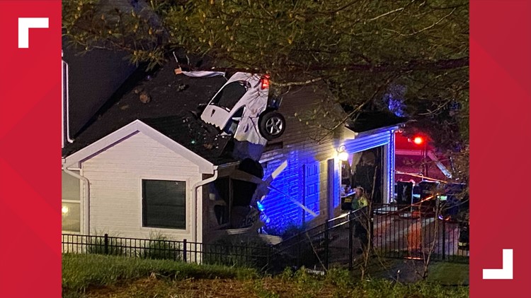 Car crashes through roof of Missouri home after tumbling down embankment Car crashes through roof of Missouri home after tumbling down embankment