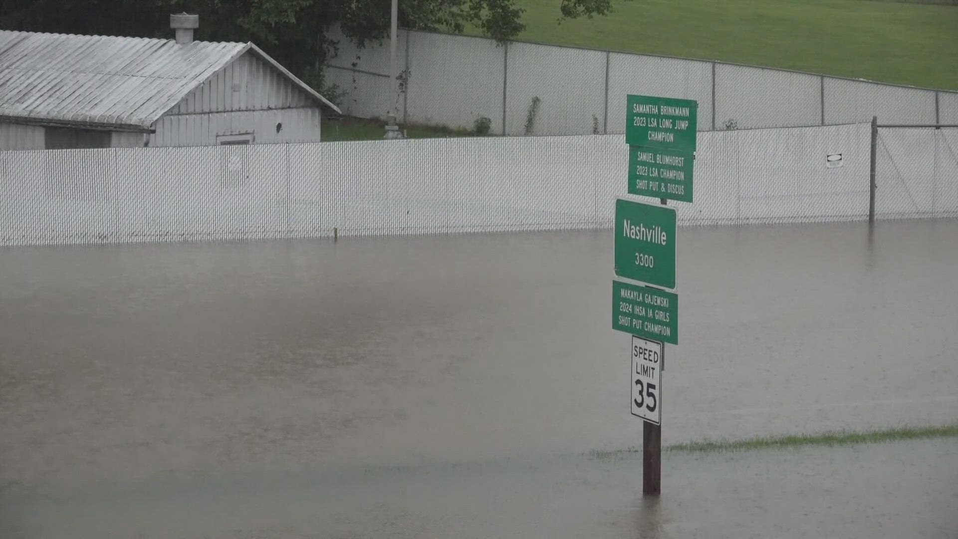 Woman rescued after reservoir dam overflows in Nashville, IL | wqad.com