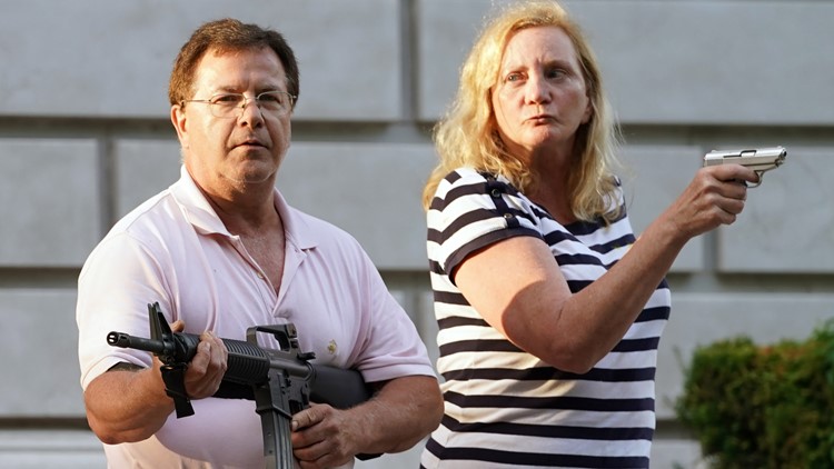 Gun-waving couple in St. Louis sues news photographer | www.waldenwongart.com