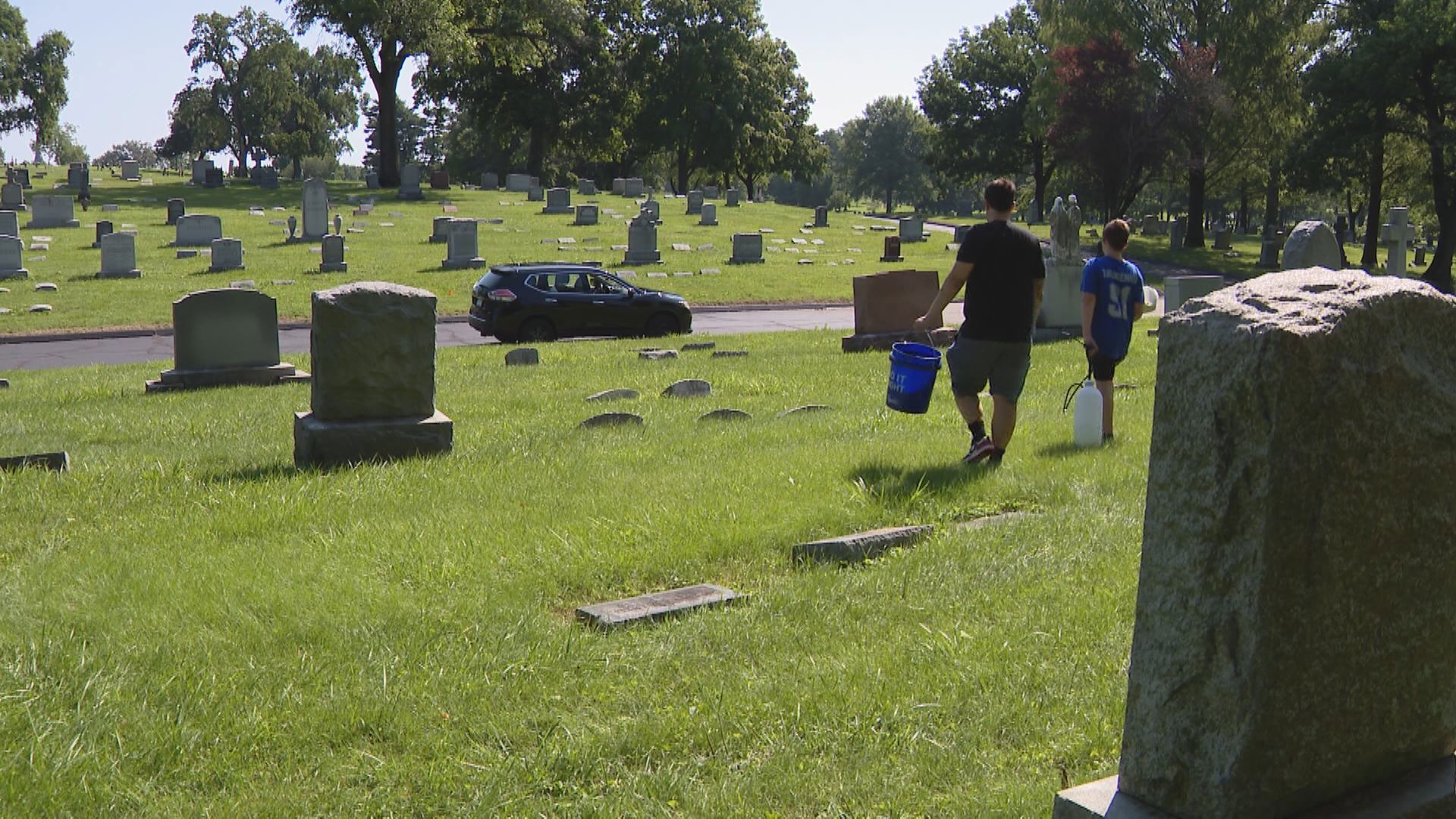 A father and son duo are restoring headstones in a long-neglected cemetery. They aren't just cleaning the markers of famous residents, they clean for everyone.