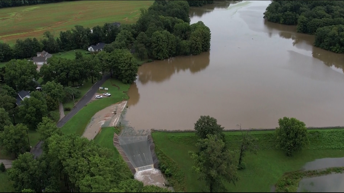 Woman rescued after reservoir dam overflows in Nashville, IL