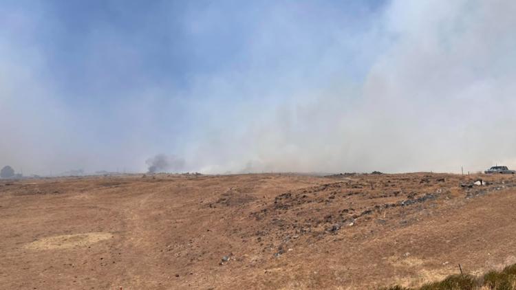 Fire crews battle fast growing wildfire near Wendell