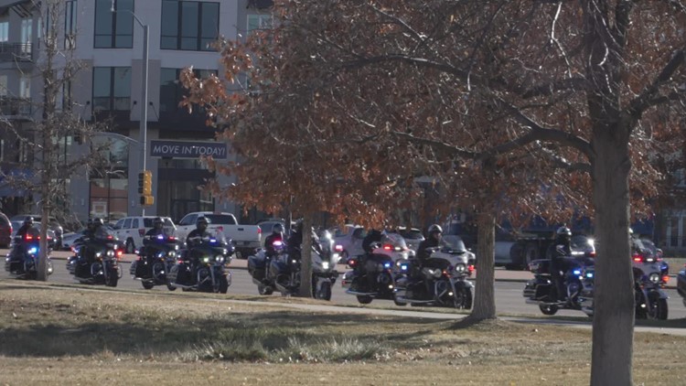 Cops Fighting Cancer bring gift cards and joy to children