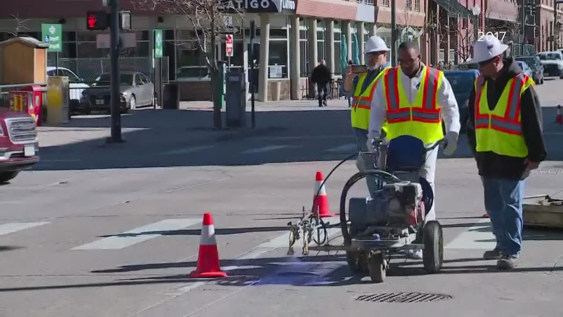 Crews are getting ready for the Colorado Rockies home opener on Friday by bringing back a special tradition - the painting of the purple stripe on Blake Street.