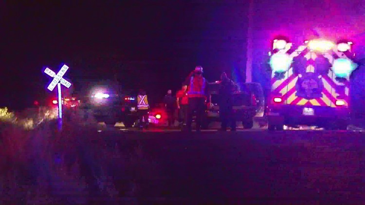 Woman hit by train while in police cruiser released from hospital