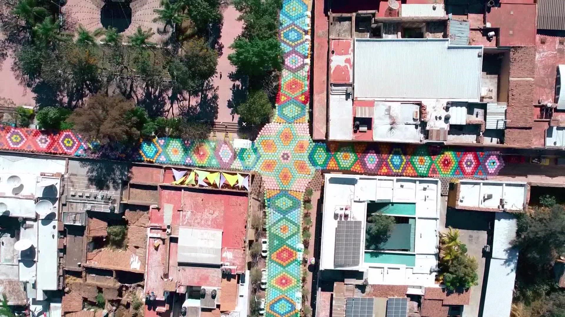 Thousands of fabrics hang from the streets of Etzatlan, located in western Mexico after some 200 craftswomen created a woven sky honoring the lord of mercy.