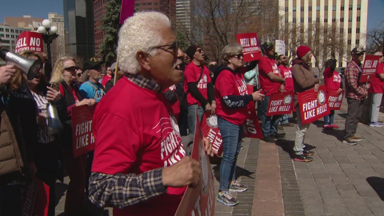 Postal service workers, supporters rally at Colorado Capitol