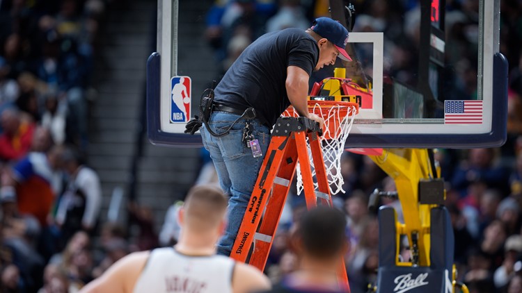 Big dunk leaves rim crooked, delays Celtics-Nuggets game