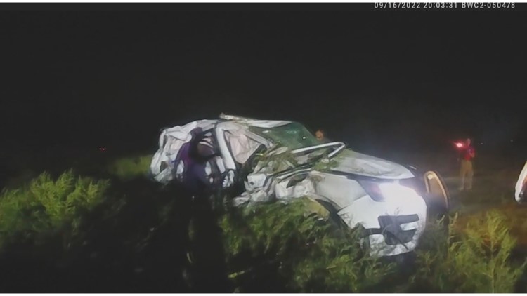 2 officers charged after woman hit by train while in police car