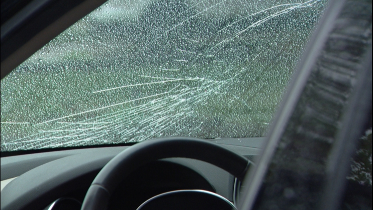 Object falls from Westminster overpass, damages woman's windshield