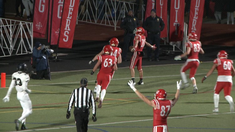 Regis Jesuit's offense explodes in 5A football playoff win over Fossil Ridge