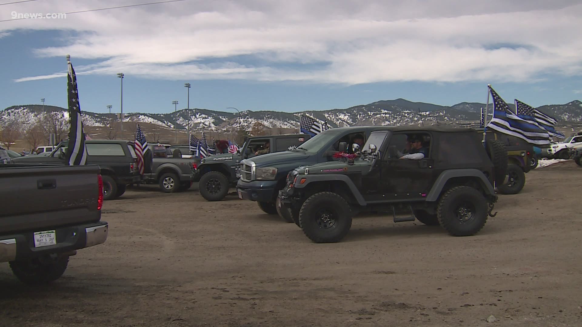 A huge convoy of cars rode from Arvada to Boulder Police headquarters Sunday to honor Officer Eric Talley and the nine other people killed.