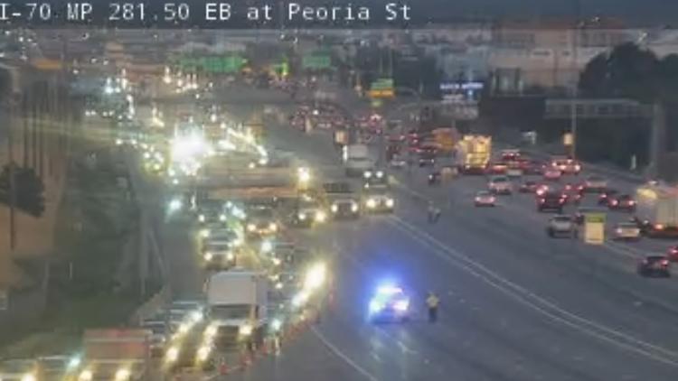 Passenger who exited vehicle to retrieve object on I-70 struck and killed