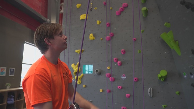 Organization teaching kids with disabilities to climb