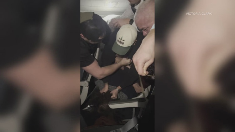 Man charged for punching, damaging window on flight from Denver to Houston