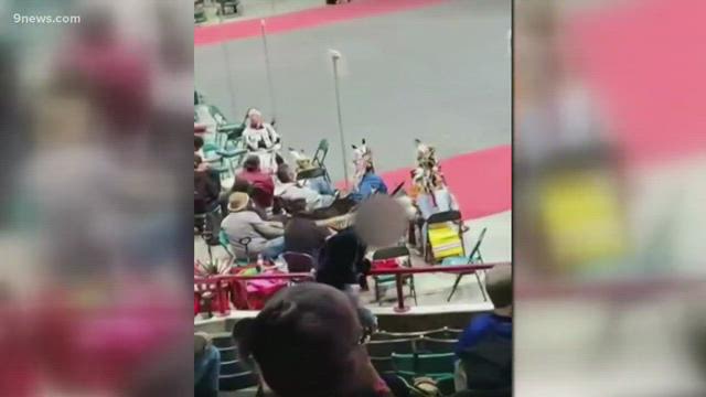 Several cameras captured a moment of disrespect at the Denver March Powwow, as a non-Native American woman picked up a piece of regalia and started dancing around with it on her head.