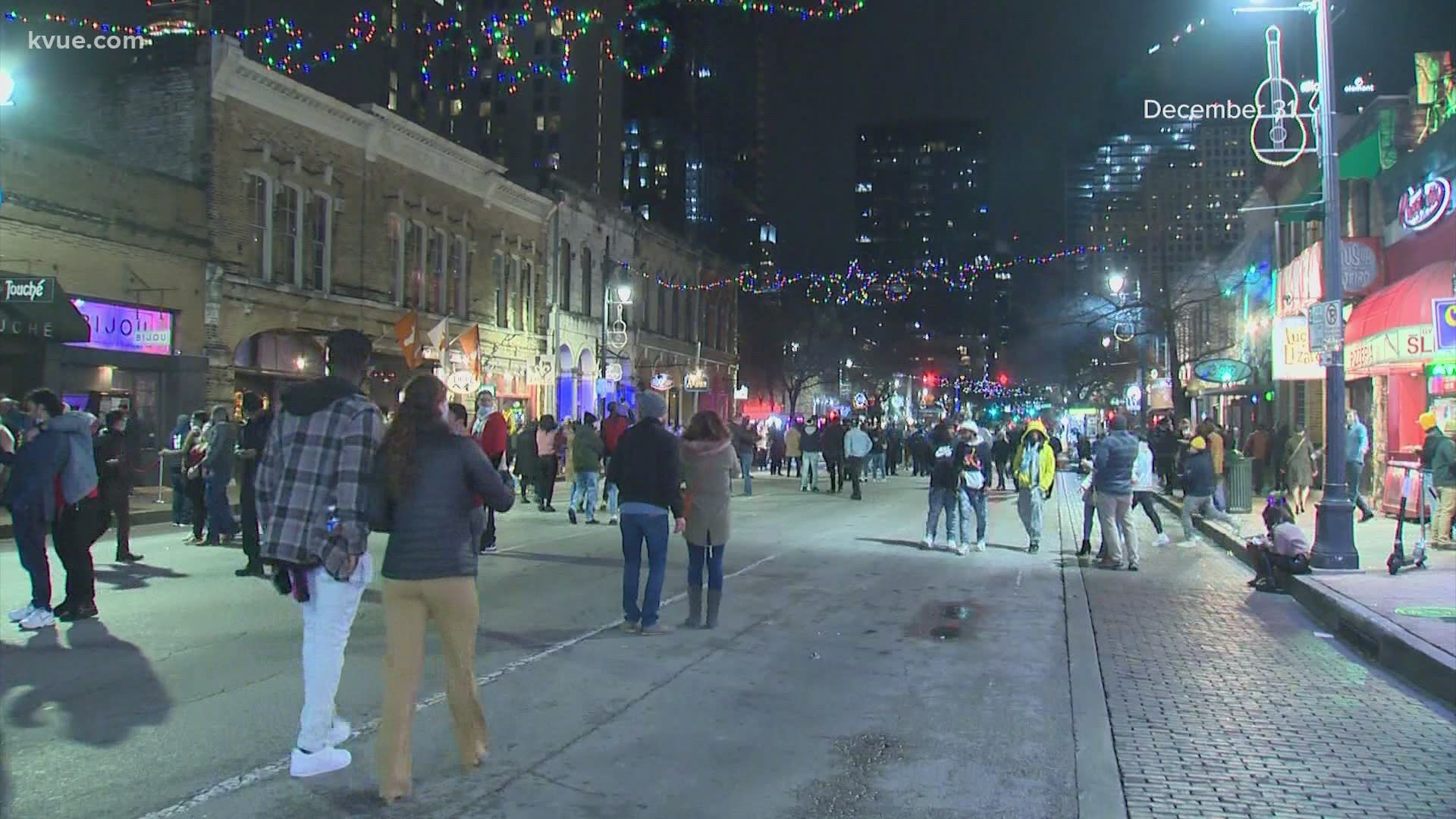 On Sixth Street throughout New Year's Eve, there were long lines to get into the bars downtown.