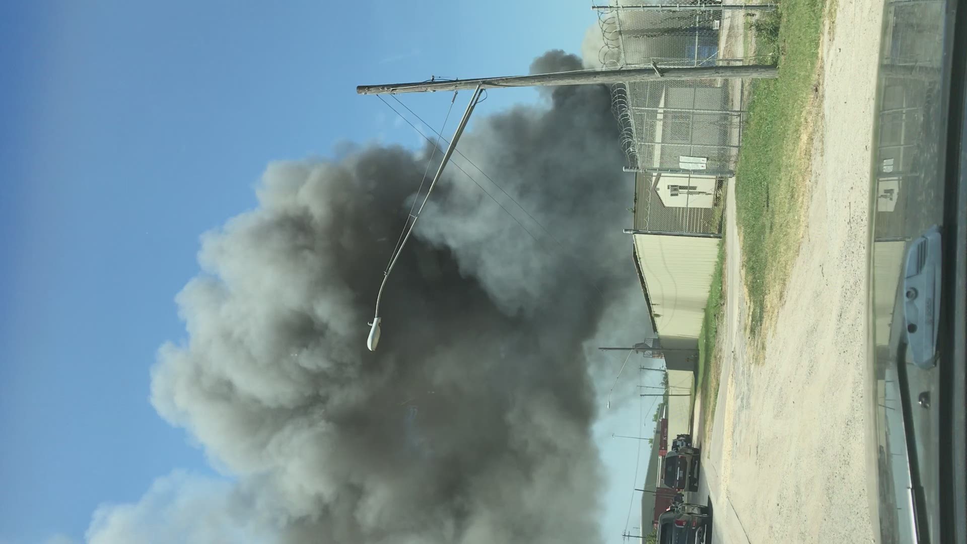 A trash fire sent a large plume of smoke into the sky on July 25, 2019. Courtesy of Isabel Benites.
