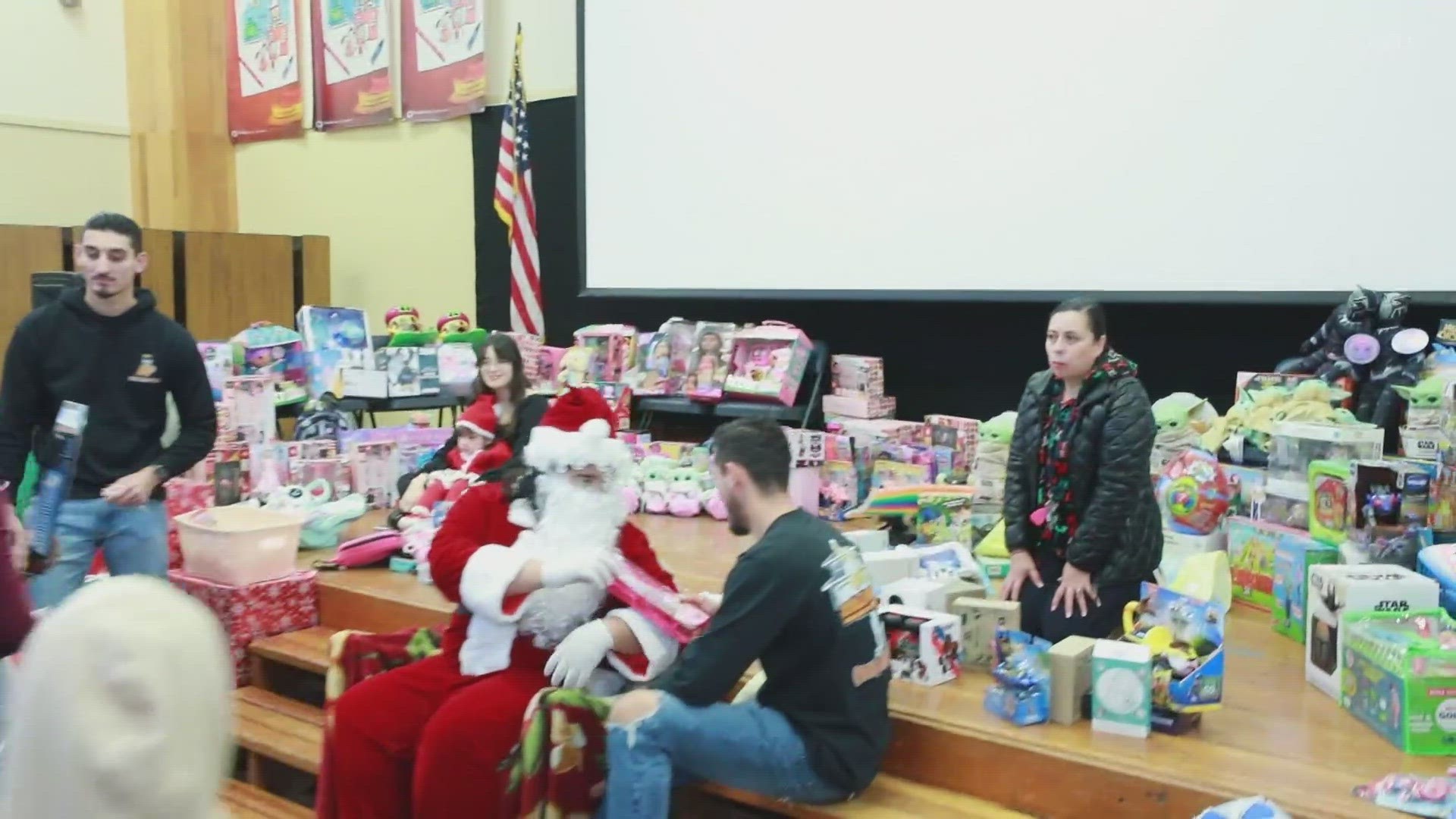 Sacramento family gifts more than 300 toys to students