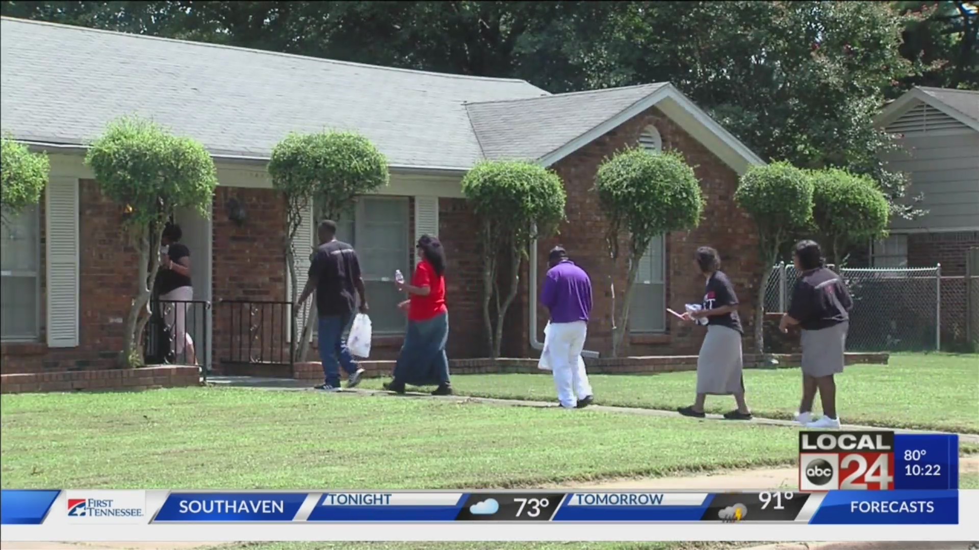 Greater Community Temple members go door-to-door to offer prayer & healing to local communities